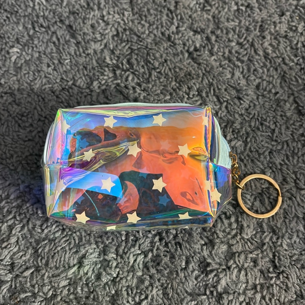 NWOT iridescent see through pouch with stars decor